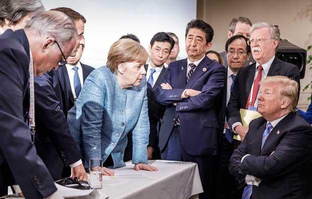 6月に行われた主要7カ国首脳会議（G7サミット）では、ドイツのメルケル首相（中央）をはじめ、各国の首脳がアメリカの貿易政策を批判した（写真：Getty Images）