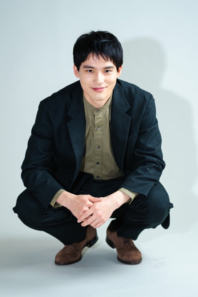 人懐こい笑顔を見せる水上さん。同世代のカメラマンと楽し気にやりとりした（撮影／写真映像部・和仁貢介）