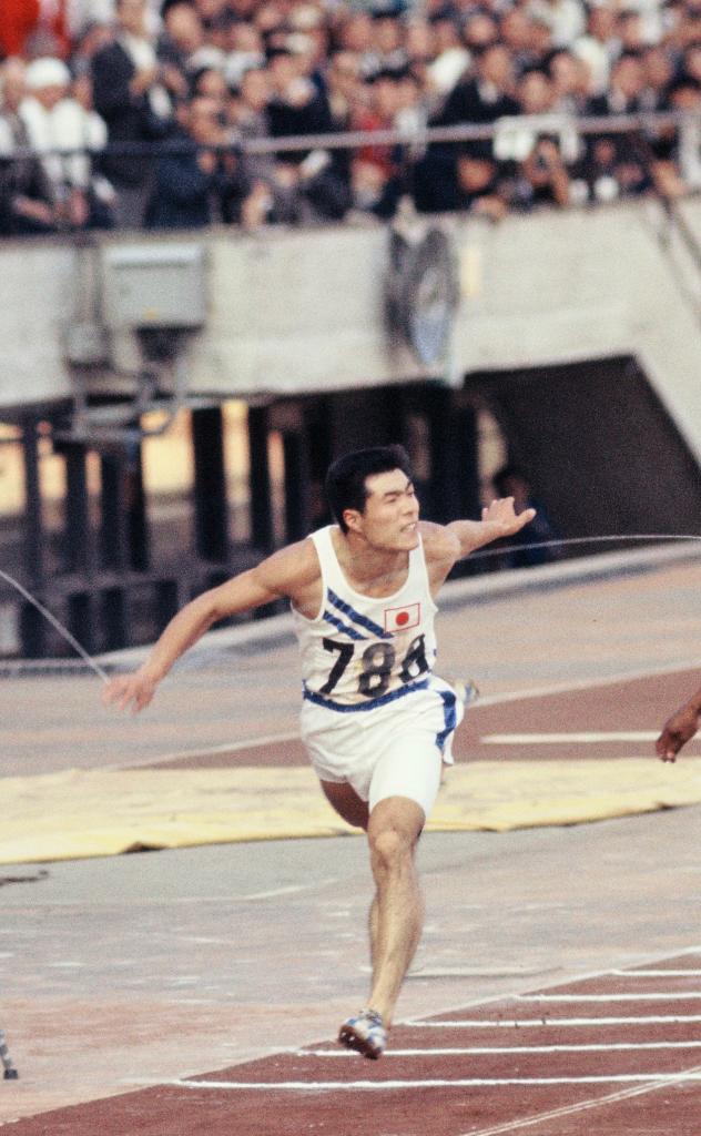 陸上100メートルの元日本記録保持者で、五輪にも1964年の東京大会と68年のメキシコ大会に出場した飯島秀雄選手（ｃ）朝日新聞社