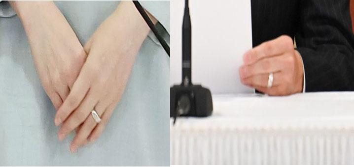 記者会見で二人の薬指に光った結婚指輪(JMPA)