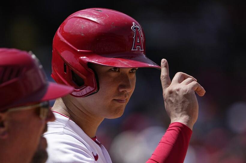 フィールドの大谷はいつも楽しそうだ。二刀流の過酷な調整や大きなプレッシャーの中でも笑顔を絶やさない（ＡＰ／アフロ）