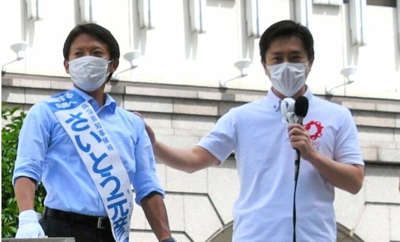2021年の兵庫知事選で初当選を目指す斎藤氏（左）を応援する吉村氏