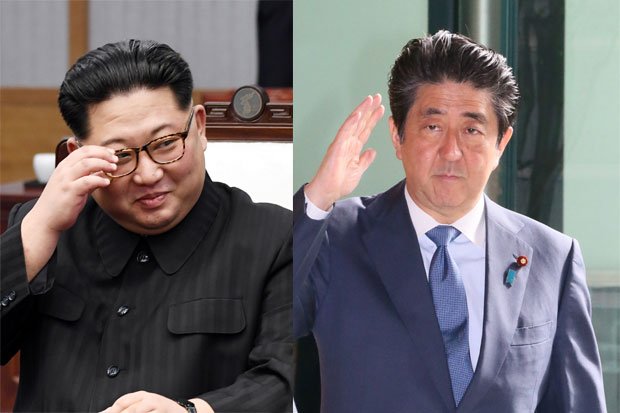 外交攻勢を強める金正恩氏（左）と様子見するしかない安倍首相　（ｃ）朝日新聞社