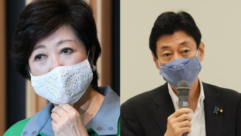 都知事マスクはお友達の手作り(左)、西村大臣がアベノマスク着用で、ネットを騒がせたことも (c)朝日新聞社